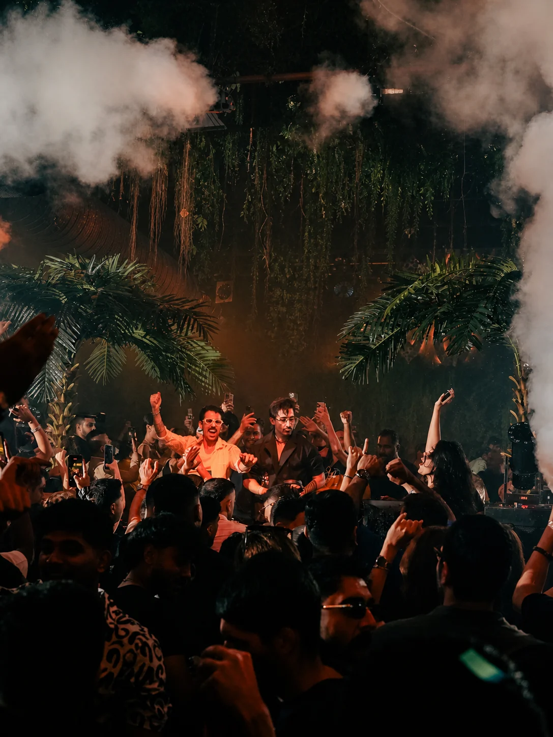 Vessbroz performing in the middle of an energetic crowd